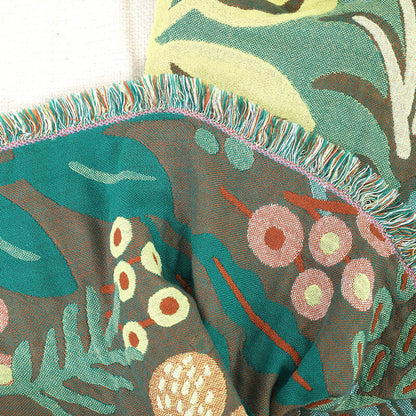 Close-up of fringed cotton jacquard blanket edge