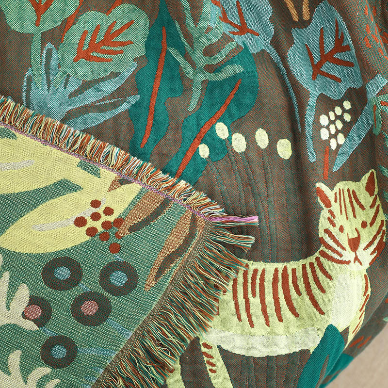 Reversible jungle animal throw blanket with woven tiger detail