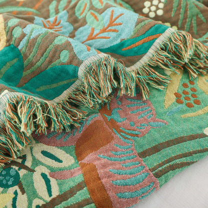 Multi-color fringe detail on jungle animal throw blanket