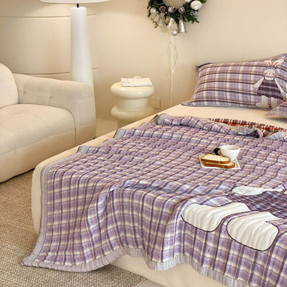 Purple plaid bunny kids comforter styled on a bed with soft quilted texture and cozy room decor