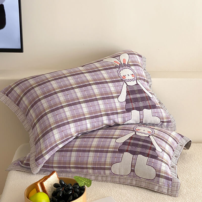 Matching purple bunny pillowcases with plaid cotton muslin fabric and cute bunny artwork