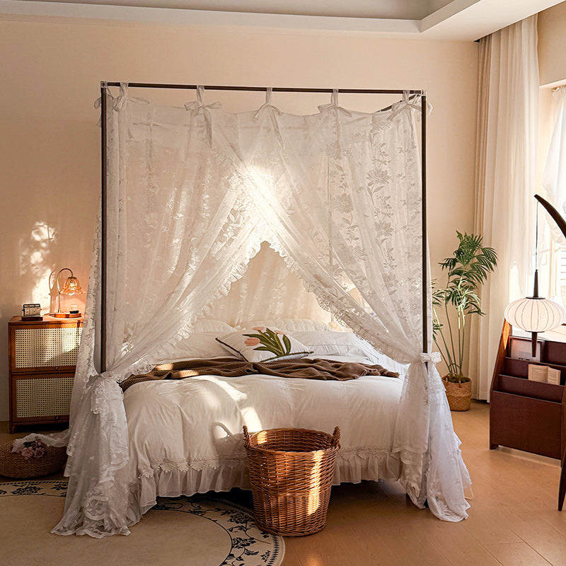 Bedroom with a canopy bed and decorative elements