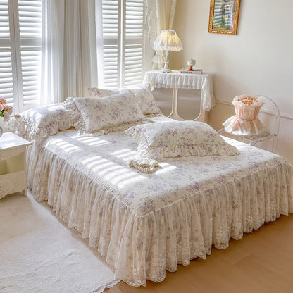 Full view of Lavender Meadow bed skirt featuring double-layered lace trim in a sunlit vintage bedroom.