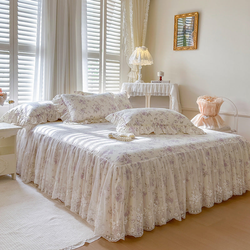 Side profile of Romantic Garden Bed Skirt in Lavender Meadow showing the elegant drape and floral lace overlay.