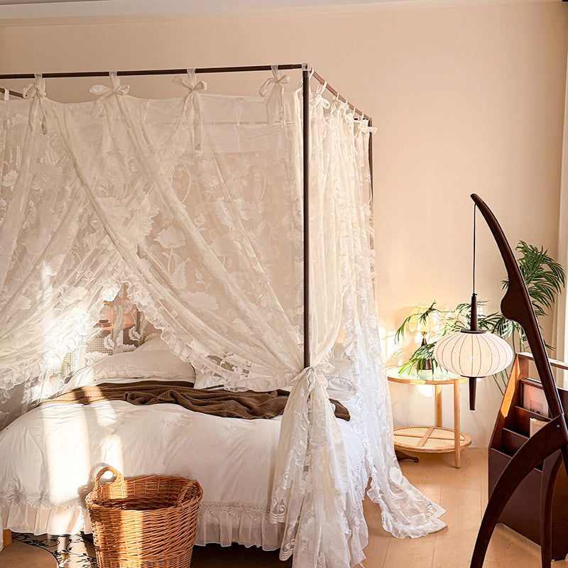 Bedroom with a canopy bed and decorative elements