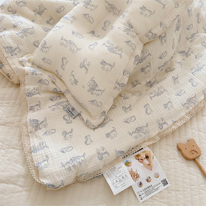 Kitty print cotton muslin comforter and pillow set for kids, showing breathable fabric and delicate lace trim