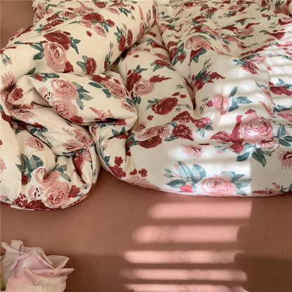 Detail of the Vintage Rose Knit Cotton Bedding Set, emphasizing the soft texture and detailed rose print.
