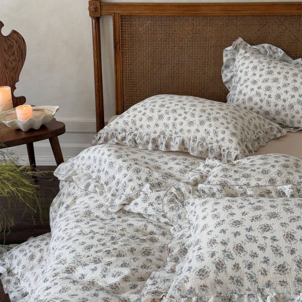 Ruffled vintage bouquet duvet cover set styled with soft florals and warm wood bedroom decor