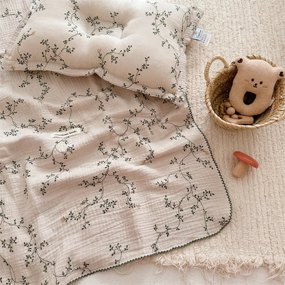 baby-blanket-and-pillow-in-cotton-muslin