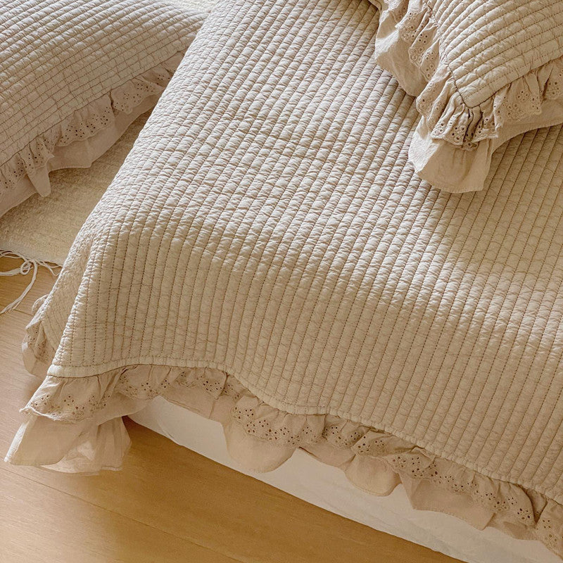 cotton quilted coverlet with lace tirm