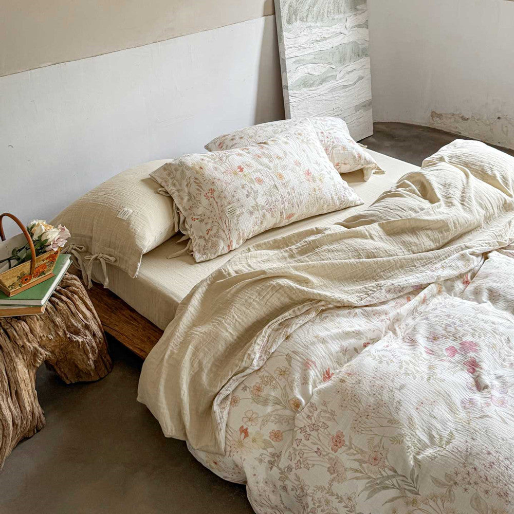 Blush white floral bedding set with matching solid sheet and pillowcases