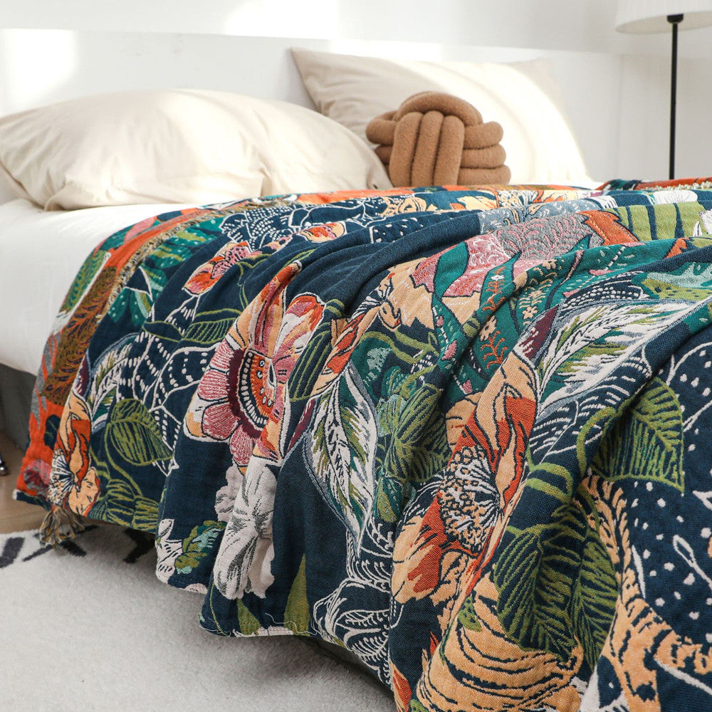 Close-up of reversible jaguar jungle cotton jacquard throw blanket