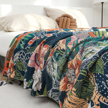 Close-up of reversible jaguar jungle cotton jacquard throw blanket