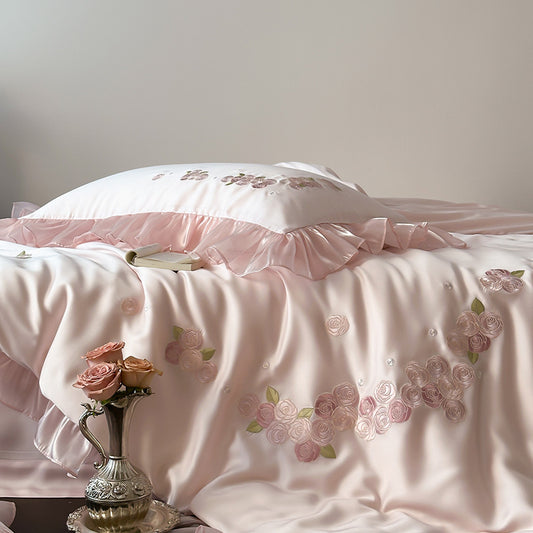 Pink Tencel bedding set with ruffles and rose embroidery
