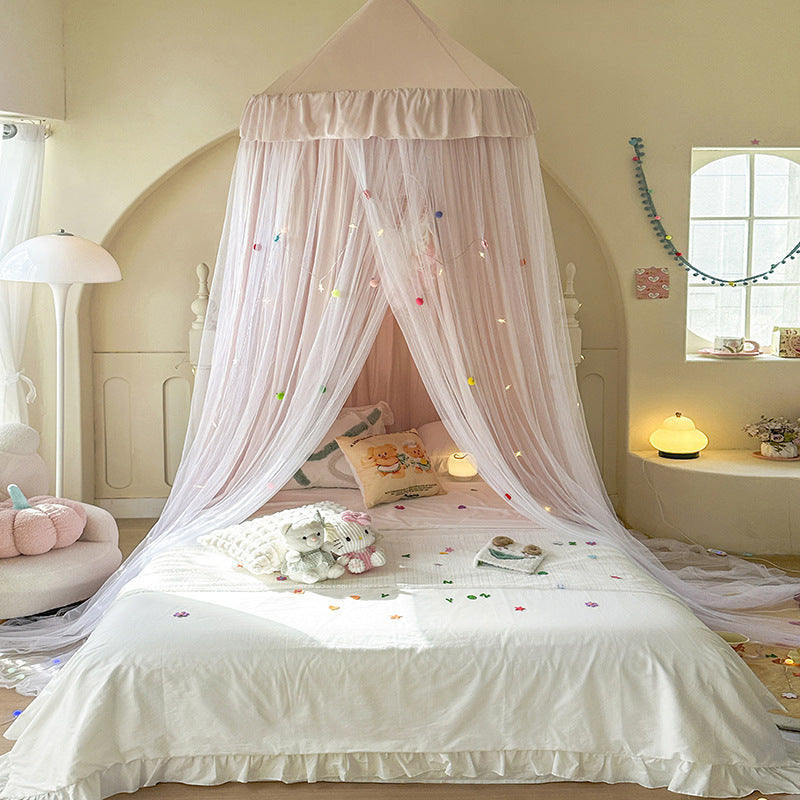 Full view of dreamy princess bed canopy with ruffles