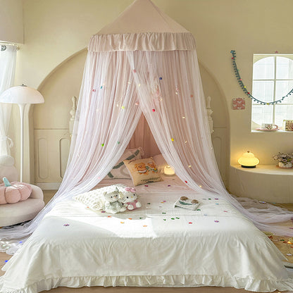 Full view of dreamy princess bed canopy with ruffles