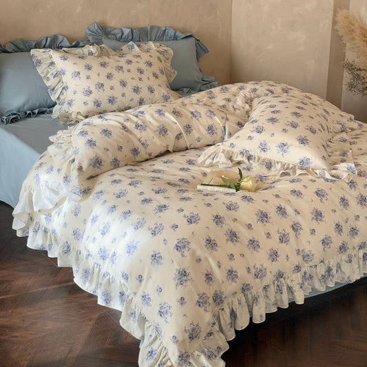 Shabby chic blue rose bedding set, with a full view of the ruffled duvet and pillows, creating a timeless and romantic look perfect for a classic bedroom aesthetic.