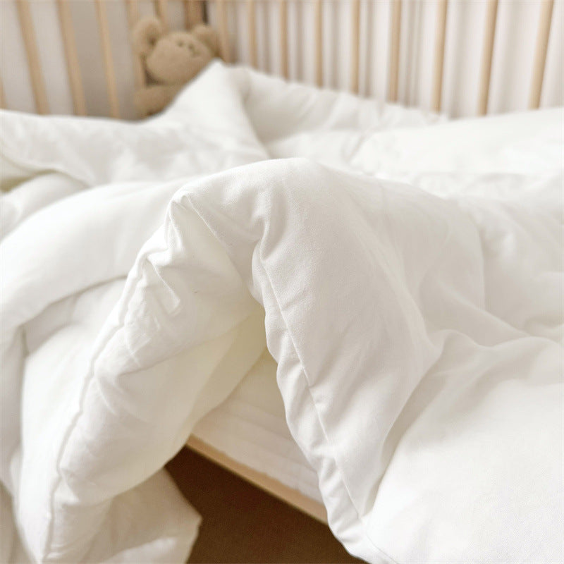Soft comforter insert on toddler mattress, suitable for baby or toddler bedding setups