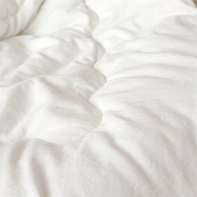 Breathable toddler comforter insert shown close-up, made to fit inside toddler duvet covers
